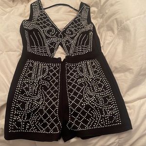 Romper with metal hardware